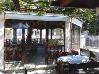 Reštaurácia alebo iné gastronomické zariadenie v ubytovaní Patra Rooms Skala Prinou