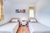 Posteľ alebo postele v izbe v ubytovaní Family Villa in Benifayó with Year-Round Private Pool