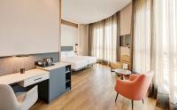 A bed or beds in a room at Sercotel Sorolla Palace