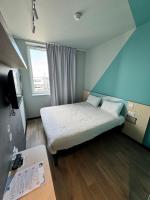 Łóżko lub łóżka w pokoju w obiekcie ibis budget Nancy Laxou