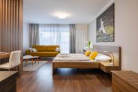 Postel nebo postele na pokoji v ubytování Apartmány Viva Třeboň