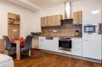 Kuchyň nebo kuchyňský kout v ubytování Apartmány Viva Třeboň