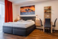 Postel nebo postele na pokoji v ubytování Apartmány Viva Třeboň