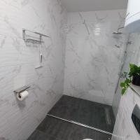 Kúpeľňa v ubytovaní Apartments La Bombonera