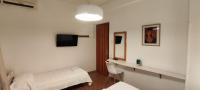 A television and/or entertainment centre at Papadioti Apartments