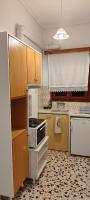 A kitchen or kitchenette at Papadioti Apartments