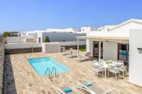 The swimming pool at or close to Villa Muzu by Villa Plus