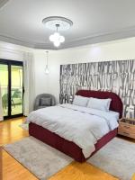 Postel nebo postele na pokoji v ubytování Cairo Central & modern apartment