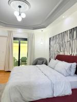 Postel nebo postele na pokoji v ubytování Cairo Central & modern apartment