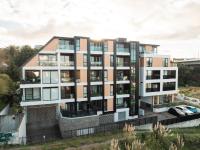 an architectural rendering of a apartment building at The Edgerley Suites in Auckland
