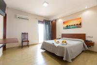 Posteľ alebo postele v izbe v ubytovaní Hotel Olympia Ronda I