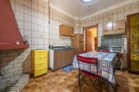 A kitchen or kitchenette at Casa vacanza Elena
