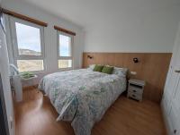Posteľ alebo postele v izbe v ubytovaní Apartamento Ginebra Sierra Nevada