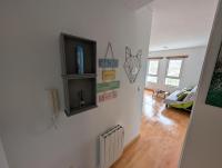 Televízia a/alebo spoločenská miestnosť v ubytovaní Apartamento Ginebra Sierra Nevada
