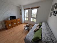 Televízia a/alebo spoločenská miestnosť v ubytovaní Apartamento Ginebra Sierra Nevada