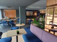 Reštaurácia alebo iné gastronomické zariadenie v ubytovaní Desilva Inn Katowice Airport