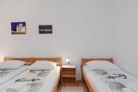 Posteľ alebo postele v izbe v ubytovaní Apartment Slava