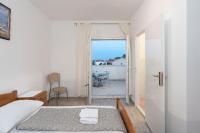 Posteľ alebo postele v izbe v ubytovaní Apartment Slava