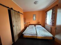 Postel nebo postele na pokoji v ubytování Apartmány Forest