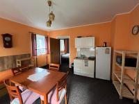 Kuchyň nebo kuchyňský kout v ubytování Apartmány Forest