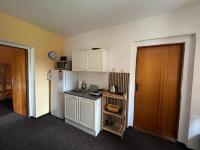 Kuchyň nebo kuchyňský kout v ubytování Apartmány Forest