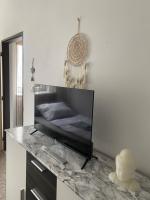 TV a/nebo společenská místnost v ubytování Ubytování Linda