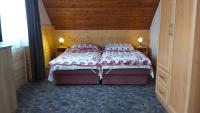 Posteľ alebo postele v izbe v ubytovaní Al Do Apartman