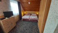Posteľ alebo postele v izbe v ubytovaní Al Do Apartman
