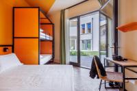 Posteľ alebo postele v izbe v ubytovaní YellowSquare Florence