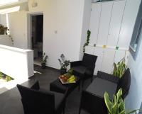 Posezení v ubytování Apartment in the centre for 4 people