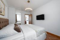 Posteľ alebo postele v izbe v ubytovaní Apartment One , sea view , free parking