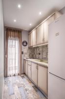 A kitchen or kitchenette at Carpe Diem Rooms Nei Pori
