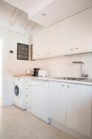 A kitchen or kitchenette at ÁTICO CENTRO HISTÓRICO MADRID