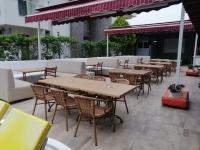 een groep tafels en stoelen op een patio bij Grand Nar Hotel ADULT ONLY - All Inclusive in Kemer