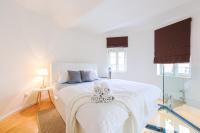 Postel nebo postele na pokoji v ubytování Stevan Apartment