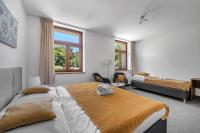 Postel nebo postele na pokoji v ubytování Hotel PODKOST