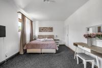 Postel nebo postele na pokoji v ubytování Hotel PODKOST