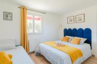 Posteľ alebo postele v izbe v ubytovaní Appartement La Baule Pornichet Terrasse - Cuisine - Calme - Wifi - Parking Gratuit