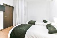Posteľ alebo postele v izbe v ubytovaní Laramond Barcelona Rooms