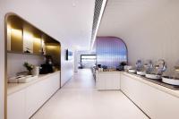 a bathroom with white counters and sinks in a room at Atour X Hotel Shanghai Lujiazui Lancun Road in Shanghai