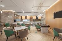 Et tv og/eller underholdning på Atour Hotel Lingang New Town