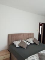 Postel nebo postele na pokoji v ubytování Apartman Kačić