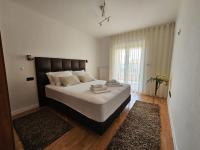 Posteľ alebo postele v izbe v ubytovaní Residence Gordana