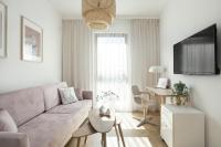 Televízia a/alebo spoločenská miestnosť v ubytovaní Elite Apartments Sunny