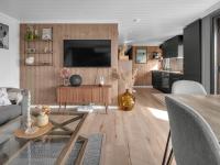 TV a/nebo společenská místnost v ubytování Chalet Kosetoppen by Interhome