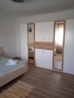 Postel nebo postele na pokoji v ubytování APARTMAN IVANO