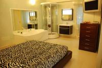 A bed or beds in a room at Hotel Residence Veliero
