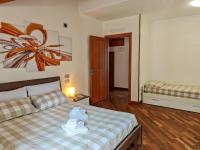 Posteľ alebo postele v izbe v ubytovaní Torretta - Ferienwohnung (SP)