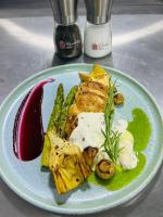 a plate of food with meat and vegetables on a table at BELKA GOLF RESİDENCE Dublex BELEK in Belek