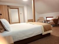 Postel nebo postele na pokoji v ubytování Evelin Deluxe House